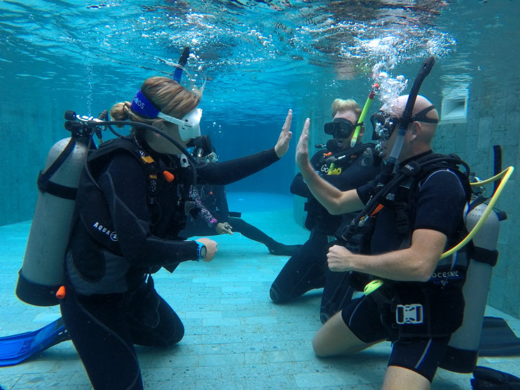 PADI Scuba Divers in Bali Working on Diving Skills in a Pool